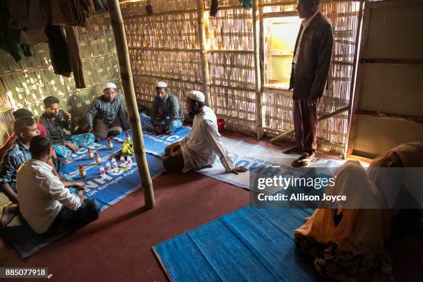 Year old Hashimullah and 16 year old Farmina Begum participate in their wedding ceremony in a Bangladesh refugee camp November 27, 2017 in Cox's...