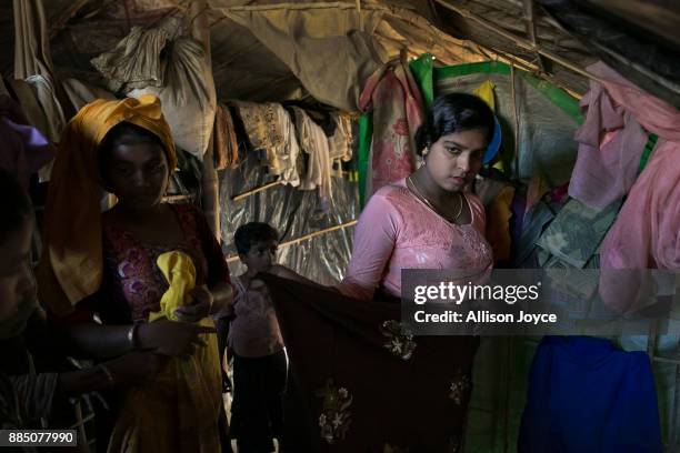 Nur Begum, who doesn't know her age but thinks she is between 14 and 16 years old, is seen on the day of her wedding to Rayeed Alam in a Bangladesh...