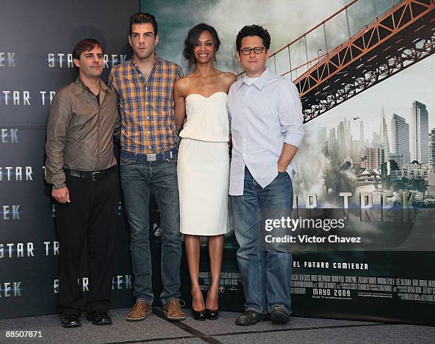 Writer Roberto Orci, actor Zachary Quinto, actress Zoe Saldana and director J.J. Abrams attend the "Star Trek" photocall at the Four Seasons Hotel...