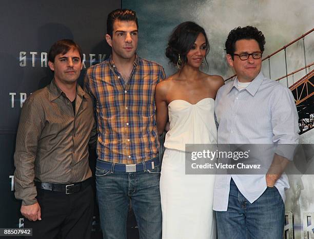 Writer Roberto Orci, actor Zachary Quinto, actress Zoe Saldana and director J.J. Abrams attend the "Star Trek" photocall at the Four Seasons Hotel...