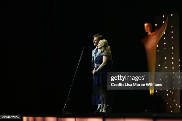 Susie Porter and Josh Lawson present on stage during the 7th AACTA Awards Presented by Foxtel | Industry Luncheon at The Star on December 4, 2017 in...