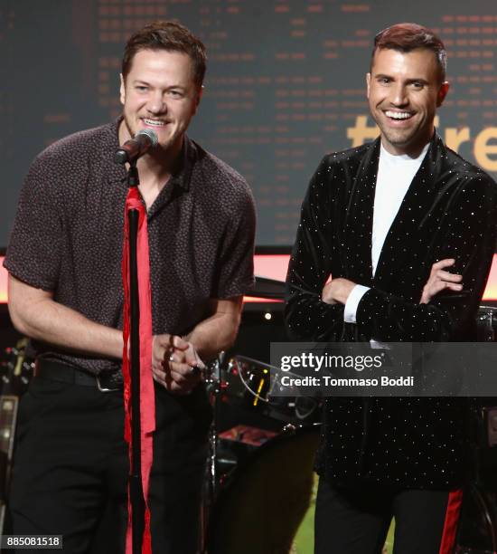 Dan Reynolds of Imagine Dragons and Tyler Glenn of Neon Trees speak onstage during The Trevor Project's 2017 TrevorLIVE LA Gala at The Beverly Hilton...