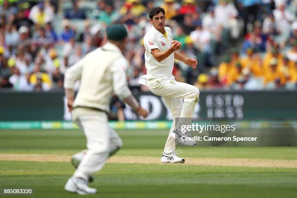 Mitchell Starc of Australia catches Jonny Bairstow of England off his own delivery during day three of the Second Test match during the 2017/18 Ashes...