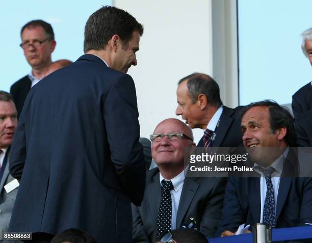 Uefa president Michel Platini and DFB team manager Oliver Bierhoff are seen prior to the UEFA U21 Championship Group B match between Spain and...