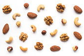Walnut, cashew, almond and hazelnut on white background.