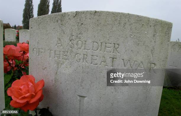 The grave of an unknown soldier, a casualty of World War I, in Tyne Cot Commonwealth War Graves Cemetery and Memorial to the Missing near Ypres,...