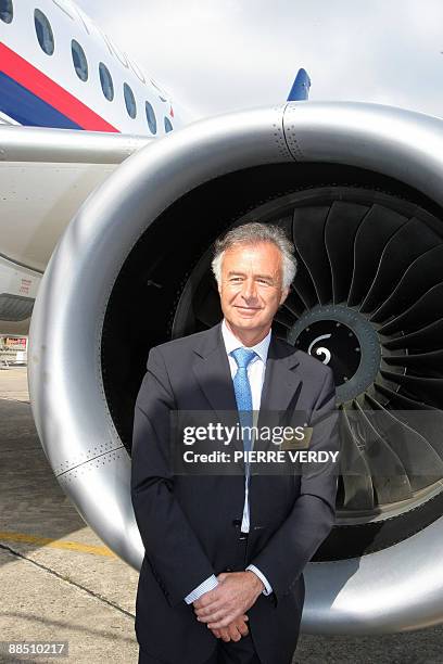 French aerospace group Snecma CEO Philipe Petitcolin poses in front of the new Sukhoi Superjet 100 jetliner on June 16, 2009 at the week long 48th...