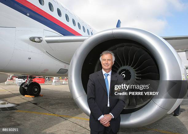 French aerospace group Snecma CEO Philipe Petitcolin poses in front of the new Sukhoi Superjet 100 jetliner on June 16, 2009 at the week long 48th...