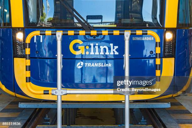 close-up gold coast light rail tram being serviced in depot - gold coast light rail stock pictures, royalty-free photos & images