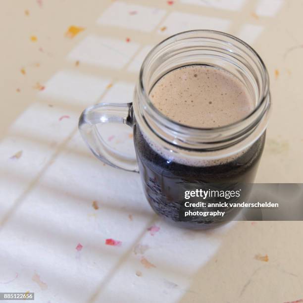 stout in a jar. - porter stock pictures, royalty-free photos & images