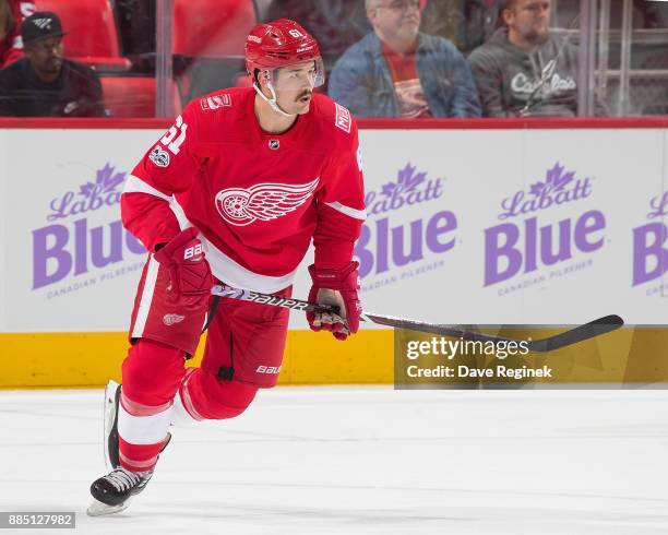 Xavier Ouellet of the Detroit Red Wings follows the play against the Los Angeles Kings during an NHL game at Little Caesars Arena on November 28,...