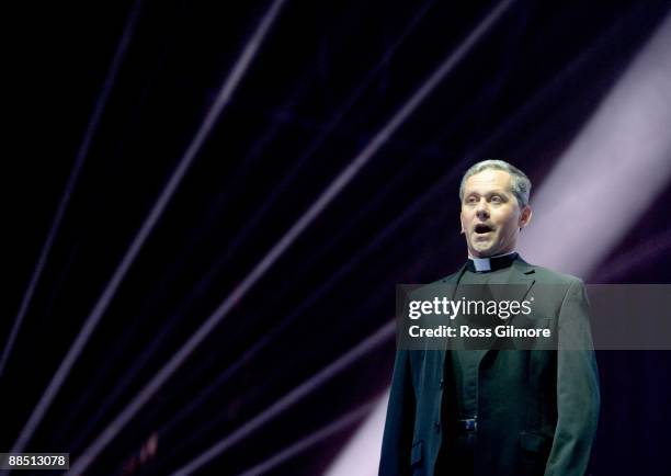 Father Martin O'Hagan performs on stage at Clyde Auditorium on June 15, 2009 in Glasgow, Scotland.