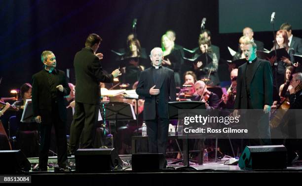 Father Martin O'Hagan, Father Eugene O'Hagan and Father David Delargy of The Priests performs on stage at Clyde Auditorium on June 15, 2009 in...