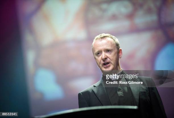 Father David Delargy of The Priests performs on stage at Clyde Auditorium on June 15, 2009 in Glasgow, Scotland.