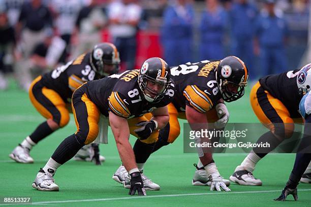 Tight end Mark Bruener of the Pittsburgh Steelers looks across the line of scrimmage while next to offensive lineman Shar Pourdanesh during a game...