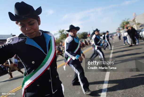 Marchers perform during the 86th Annual Procession and Mass in honor of Our Lady of Guadalupe in the traditionally Hispanic community of East Los...