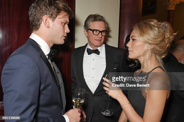 Jeremy Irvine, Colin Firth and Jodie Spencer attend a drinks reception ahead of the London Evening Standard Theatre Awards 2017 at the Theatre Royal,...