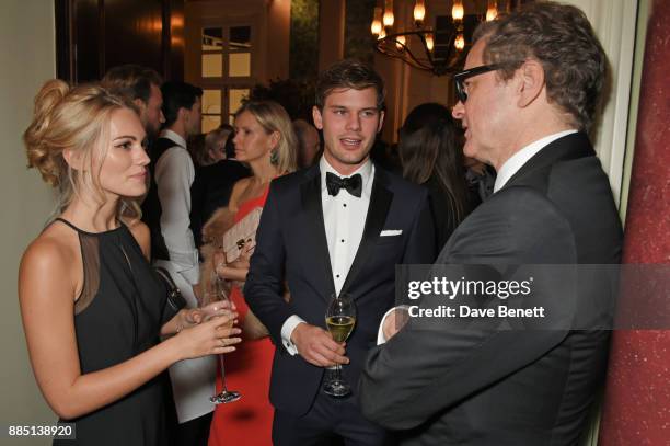 Jodie Spencer, Jeremy Irvine and Colin Firth attend a drinks reception ahead of the London Evening Standard Theatre Awards 2017 at the Theatre Royal,...