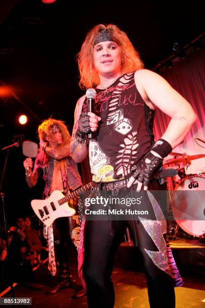 Lexxi Foxxx and Michael Starr of Steel Panther perform on stage at the Canal Room on April 1st, 2009 in New York.