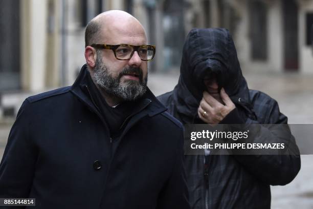 Marcel Jacob arrives with his lawyer Stephane Giuranna at the courthouse in Dijon, central eastern France, on December 4 prior to a hearing as part...