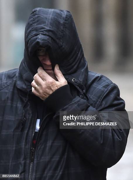 Marcel Jacob arrives at the courthouse in Dijon, central eastern France, on December 4 prior to a hearing as part of the case of the 1984 murder of...