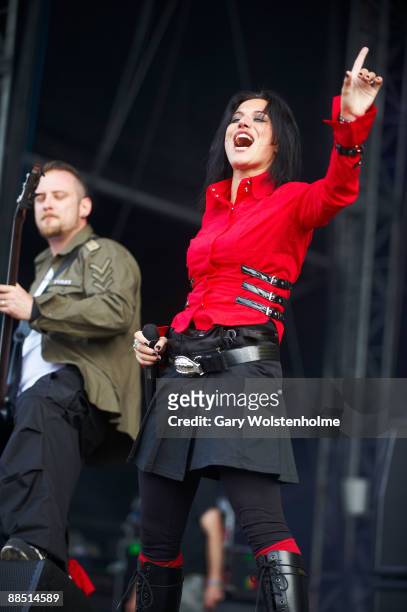 Marco "Maki" Coti Zelati and Cristina Scabbia of Lacuna Coil performs on stage on day 1 of Download Festival at Donington Park on June 12, 2009 in...