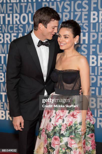 Actors Ashton Kutcher and Mila Kunis arrive at the 2018 Breakthrough Prize at NASA Ames Research Center on December 3, 2017 in Mountain View,...