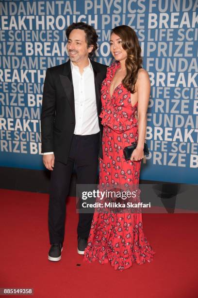 President of Alphabet Sergey Brin and Nicole Shanahan arrive at the 2018 Breakthrough Prize at NASA Ames Research Center on December 3, 2017 in...