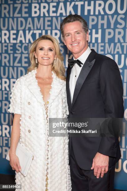 Lieutenant Governor Gavin Newsom and his wife Jennifer Siebel Newsom arrive at the 2018 Breakthrough Prize at NASA Ames Research Center on December...