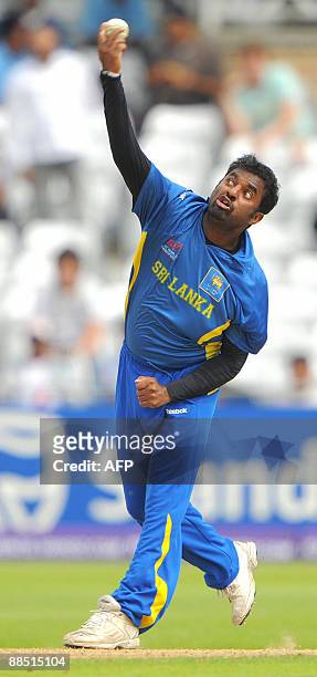 Muttiah Muralidaran of Sri Lanka bowls during the super 8 stage of the ICC world Twenty 20 cricket match against New Zealand at Trent Bridge,...