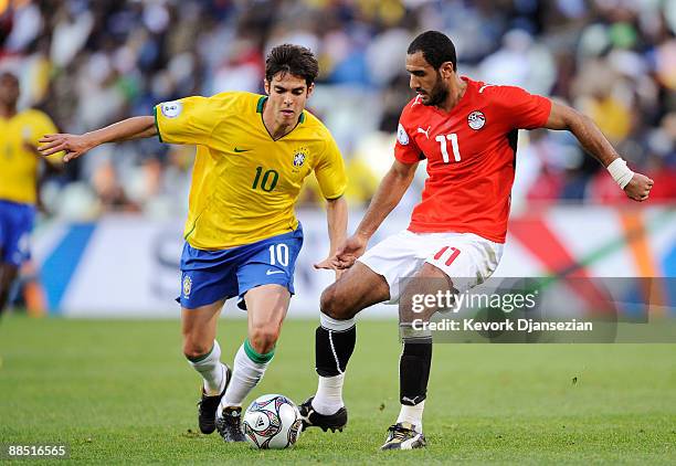 Kaka of Brazil and Mohamed Shawky of Egypt during FIFA Confederations Cup match between Brazil and Egypt at Free State stadium on June 15, 2009 in...