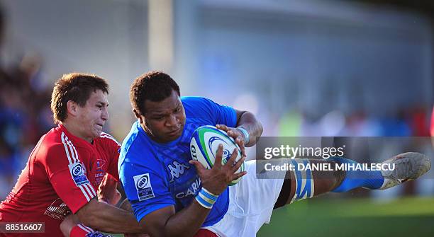 Italy's Manoa Vosawai vies against Russia's Aleksandr Gvozdovskiy during the IRB Nations Cup match Italy versus Russia rugby union match, in...