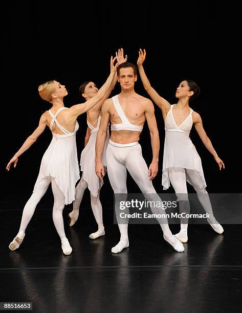 Dancers from the English National Ballet performing 'Ballets Russes' at Sadler's Wells pose in their costumes designed by Karl Lagerfeld on June 16,...