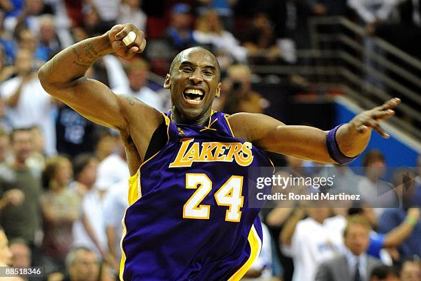 Kobe Bryant of the Los Angeles Lakers celebrates after defeating the Orlando Magic 99-86 in Game Five of the 2009 NBA Finals on June 14, 2009 at...