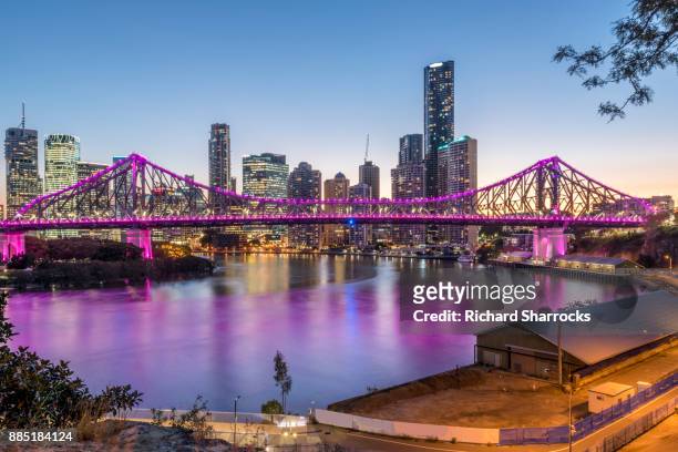 brisbane river and story bridge - brisbane stock pictures, royalty-free photos & images