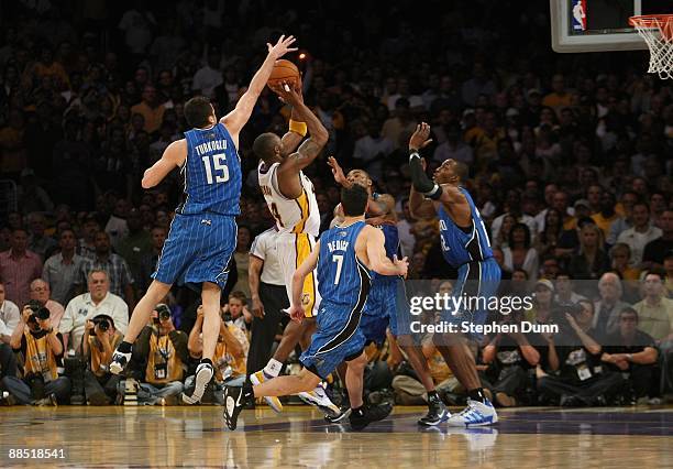 Hedo Turkoglu of the Orlando Magic blocks the shot by Kobe Bryant of the Los Angeles Lakers in the final seconds of regulation in Game Two of the...