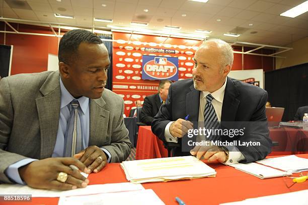 Dana Brown, director of scouting for the Washington Nationals, and Mike Rizzo, Assistnat GM and Vp of Baseball Operations talk during the Major...