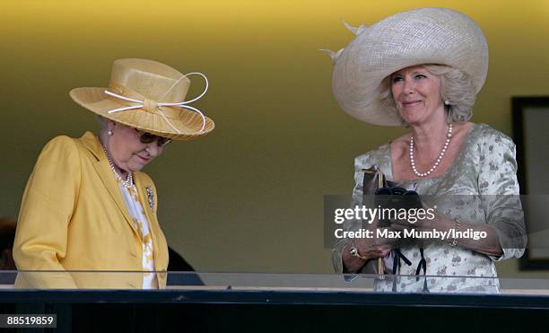 Queen Elizabeth II and HRH Camilla Duchess of Cornwall watch the racing as they attend Royal Ascot at Ascot Racecourse on June 16, 2009 in Ascot,...