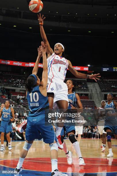 Shavonte Zellous of the Detroit Shock lays up a shot against Lindsey Harding of the Washington Mystics during the game on June 10, 2009 at The Palace...