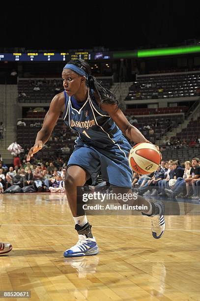 Crystal Langhorne of the Washington Mystics moves the ball against the Detroit Shock during the game on June 10, 2009 at The Palace of Auburn Hills...