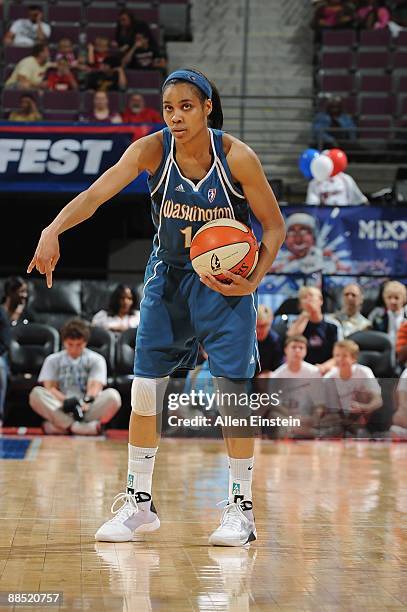 Lindsey Harding of the Washington Mystics runs the offense against the Detroit Shock during the game on June 10, 2009 at The Palace of Auburn Hills...