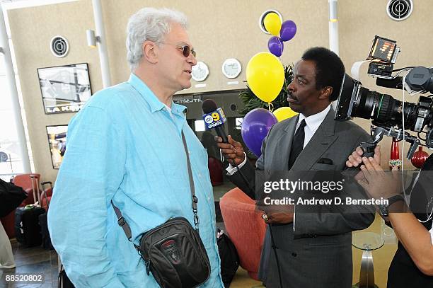 Head coach Phil Jackson of the Los Angeles Lakers is interviewed by Jim Hill after arriving at LAX on June 15, 2009 in Los Angeles, California after...