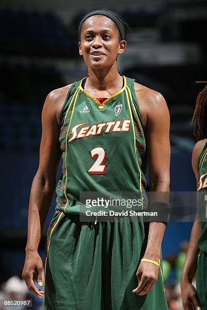 Swin Cash of the Seattle Storm takes a break from the action during the WNBA game against the Minnesota Lynx on June 12, 2009 at Target Center in...