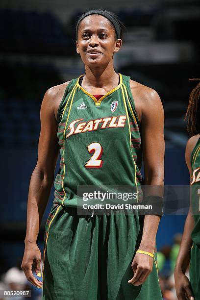 Swin Cash of the Seattle Storm takes a break from the action during the WNBA game against the Minnesota Lynx on June 12, 2009 at Target Center in...