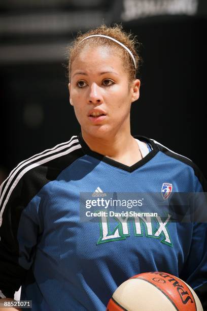 Christi Thomas of the Minnesota Lynx warms up before the WNBA game against the Seattle Storm on June 12, 2009 at Target Center in Minneapolis,...