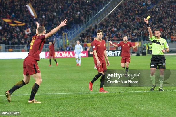 The referee Rosario Abisso shows the yellow card during the Italian Serie A football match between A.S. Roma and Spal at the Olympic Stadium in Rome,...