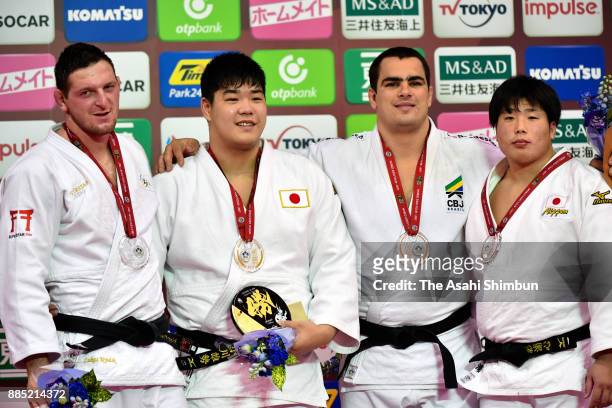 Silver medalist Lukas Krpalek of the Czech Republic, gold medalist Yusei Ogawa of Japan, bronze medallists David Moura of Brazil and Kokoro Kageura...