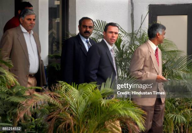 South African cricketer Nicky Boje surrounded by Delhi Police Crime branch officials at Kotwali Police Station in New Delhi on Tuesday. Boje appeared...