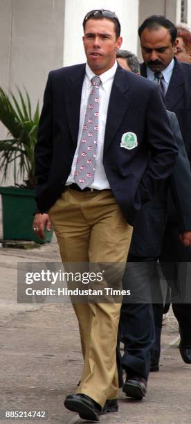 South African cricketer Nicky Boje surrounded by Delhi Police Crime branch officials at Kotwali Police Station in New Delhi on Tuesday. Boje appeared...