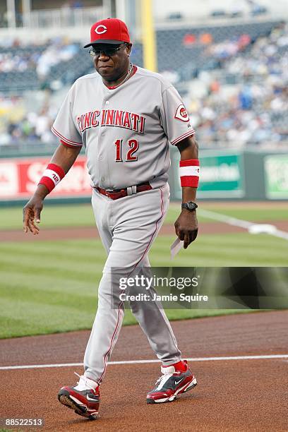 Manager Dusty Baker of the Cincinnati Reds walks to the dugout against the Kansas City Royals during the game on June 12, 2009 at Kauffman Stadium in...